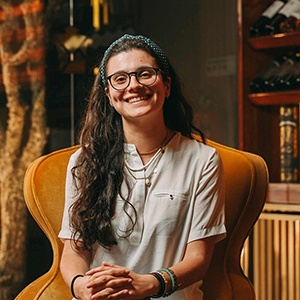 Ana Rita Pimenta smiling in a business setting